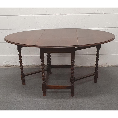 550 - A fine oak gat leg dining table with barley twist legs, 41