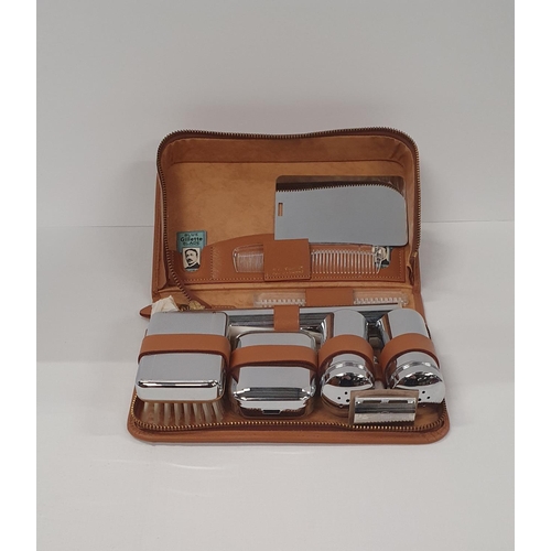 93 - Vintage tan leather gentleman's travel set with chrome implements