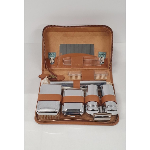 93 - Vintage tan leather gentleman's travel set with chrome implements