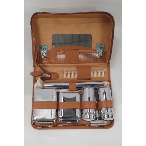 93 - Vintage tan leather gentleman's travel set with chrome implements