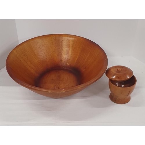 159 - Large turned and hammered wooden bowl and a wooden tobacco jar