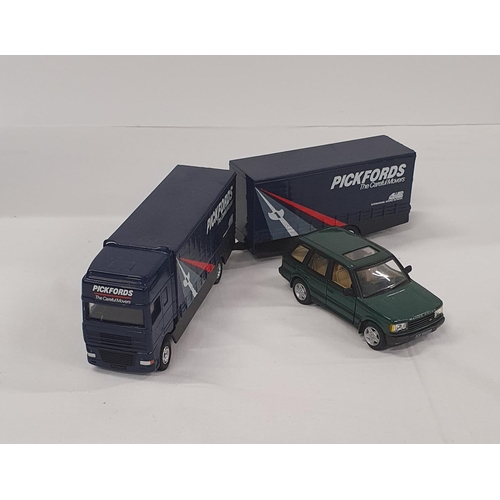 273 - A Diecast scale model of a Pickfords double trailer lorry and a green Range Rover