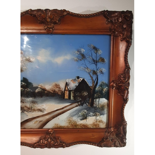 436 - Ornately framed and glazed reverse acrylic painting depicting a snowy scene (A/F), 25