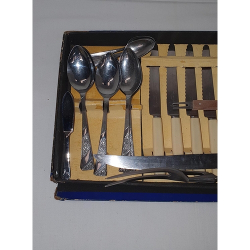 217 - Boxed canteen of cutlery with bone handled knives and carving set (missing 1 fork)