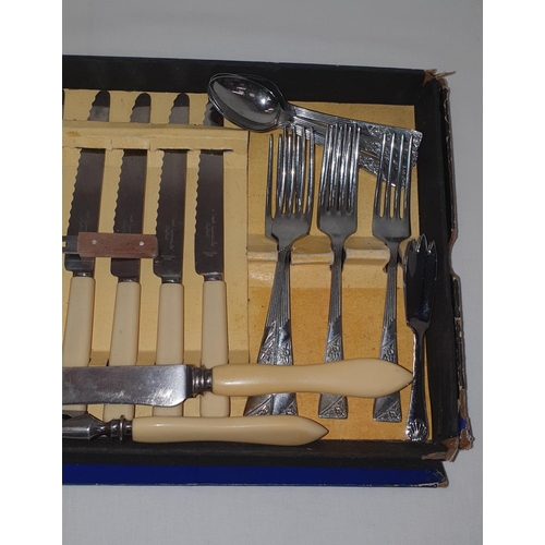 217 - Boxed canteen of cutlery with bone handled knives and carving set (missing 1 fork)