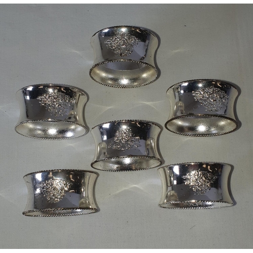 357 - 6 Silvered Glass napkin rings