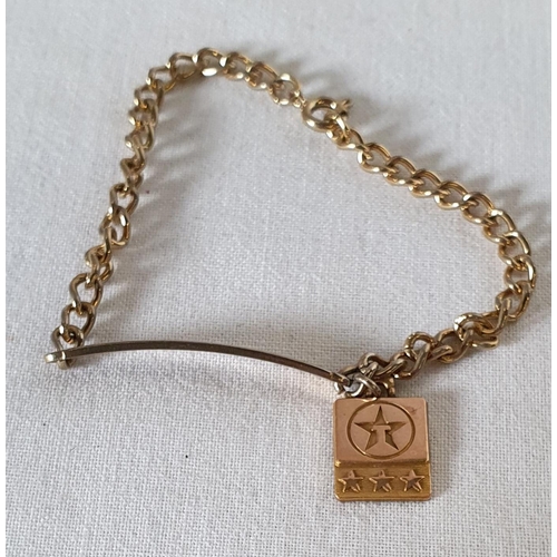 182 - Gold tone identity bracelet with 9ct gold pendant with a T in Star logo (possibly Texaco) combined w... 