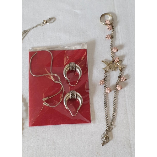 184 - Small group of silver tone costume jewellery including white metal earrings