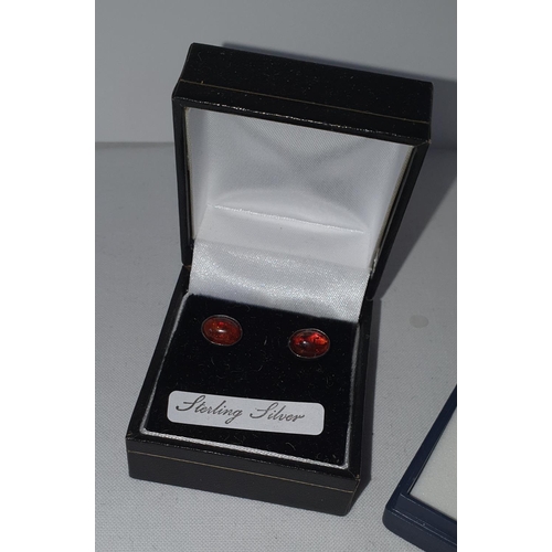 188 - 2 Cased sets of Earrings with faux Ruby's 1 Stirling Silver example