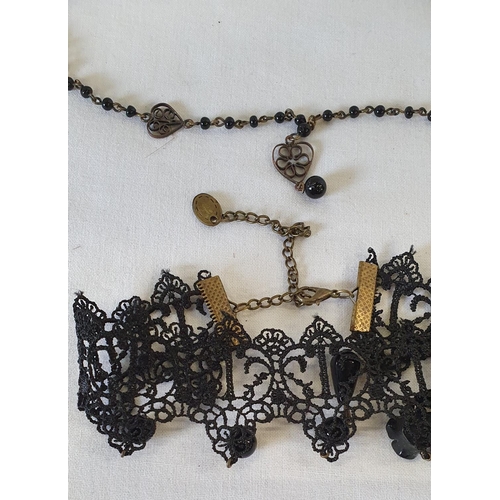 199 - Victorian style items of jewellery including lace choker with brass clasp, jet brooch and necklace