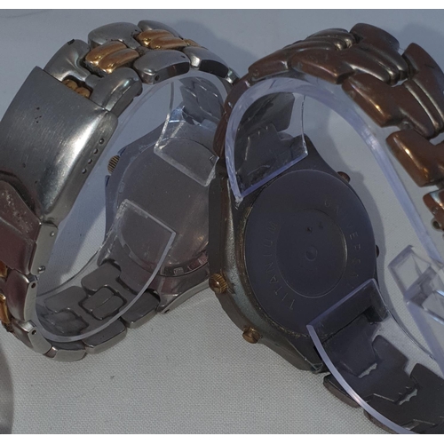 242 - Pair of good quartz wrist watches including Philip Paul Titanium