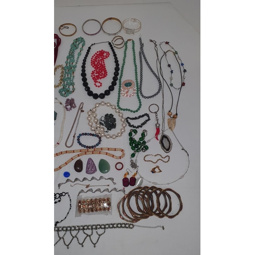 209 - Large collection of various costume jewellery including bangles, beaded necklaces, bracelets etc