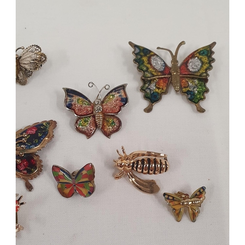 210 - Fine collection of insect brooches, mainly butterflies, including enamelled examples