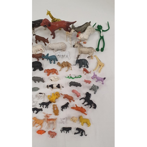 303 - Large collection of plastic farm & wild animals