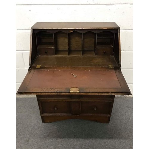 560 - oak drop front bureau with key, 30