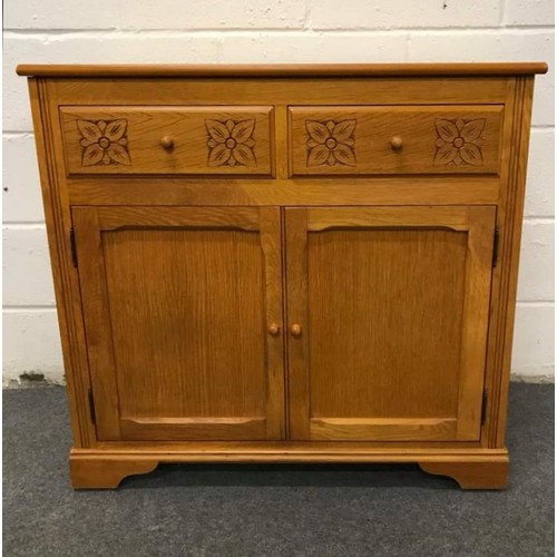 562 - Modern Blonde oak sideboard with 2 drawers and 2 doors, floral design to the front, 36