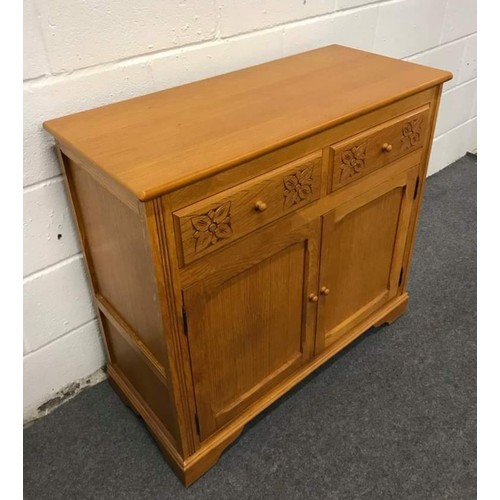 562 - Modern Blonde oak sideboard with 2 drawers and 2 doors, floral design to the front, 36