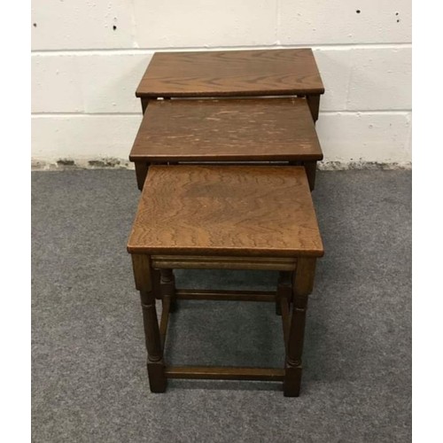 565 - Nest of 3 vintage oak tables