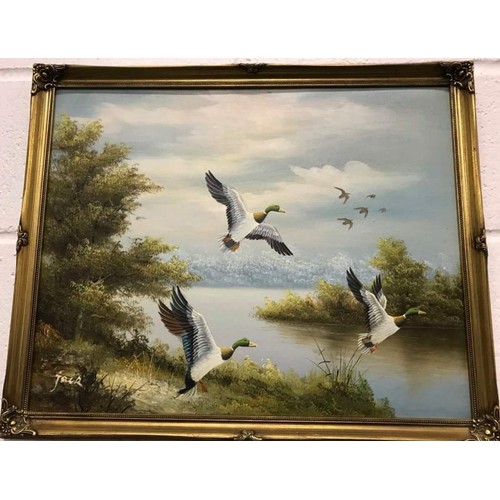 430 - Pair of gilt framed paintings both featuring mallards, signed but indistinct, each one 22