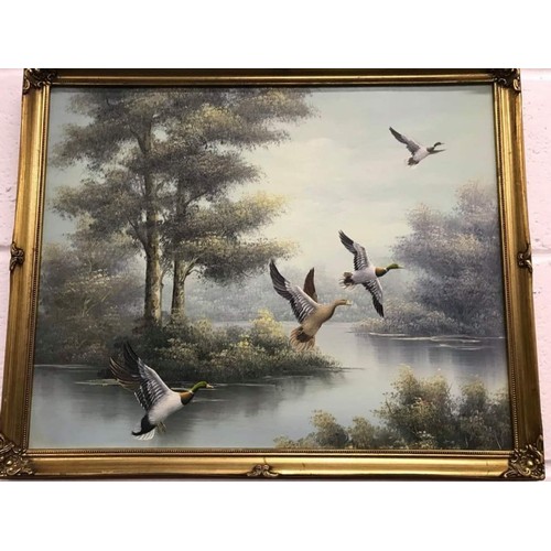 430 - Pair of gilt framed paintings both featuring mallards, signed but indistinct, each one 22