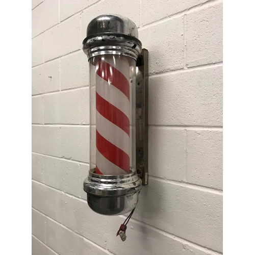 129 - Novelty plastic wall mount light in the form of a barbers shop sign