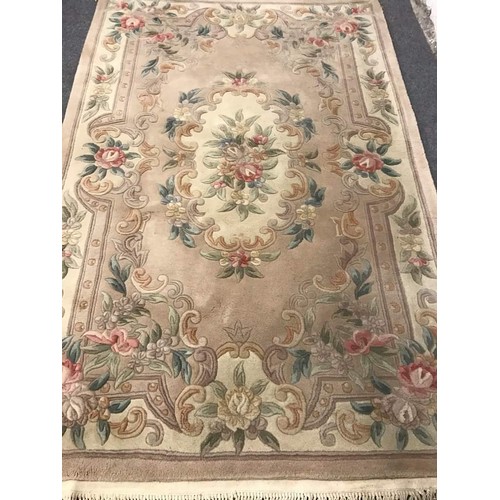 110 - Large deep pile floral over rug in beige colours, 72