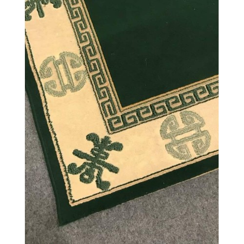 112 - Good quality oriental ground rug with green and beige colouring (B) 47.5