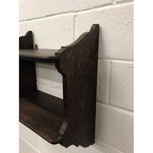 570 - Oak wall mounted kitchen shelf, 21.5