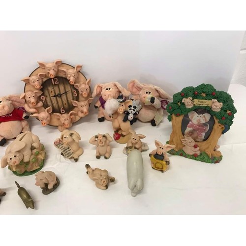 397 - Collection of Pig ornaments including many Piggin' examples, Clock, photo frames etc