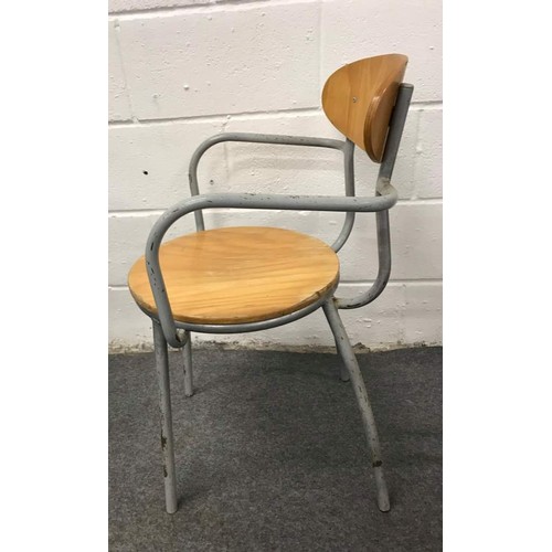 575 - 7 metal framed stacking steam wood carver chairs