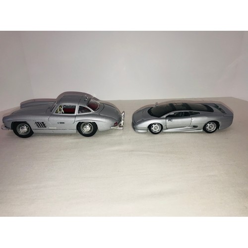 284 - 2 Diecast scale model cars by Burago & Maisto 300SL and Jaguar XJ220