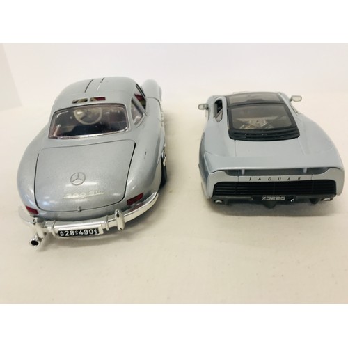 284 - 2 Diecast scale model cars by Burago & Maisto 300SL and Jaguar XJ220