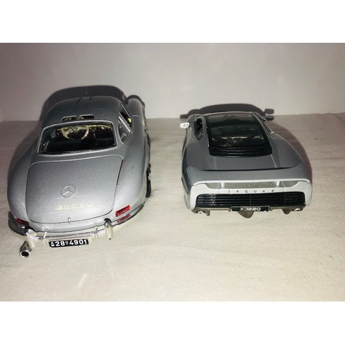 284 - 2 Diecast scale model cars by Burago & Maisto 300SL and Jaguar XJ220