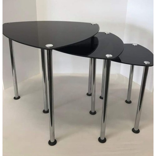 580 - Contemporary teardrop next of glass top tables with chrome supports