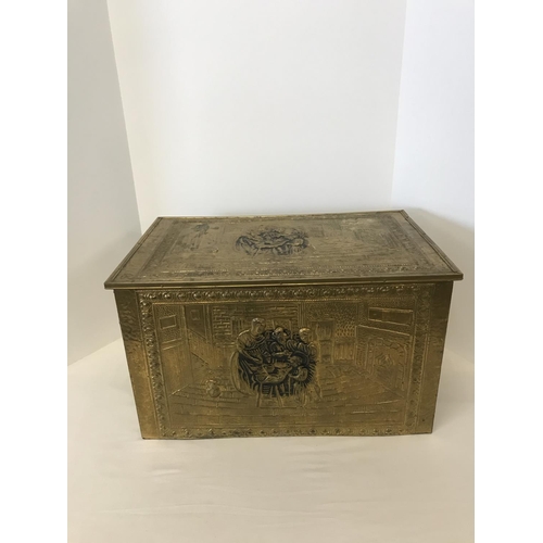 48 - Large brass embossed log box depicting family scene, 22