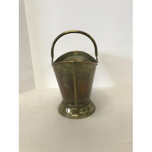 49 - Large brass coal scuttle of triangular form