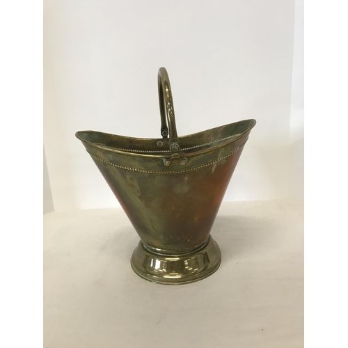 49 - Large brass coal scuttle of triangular form