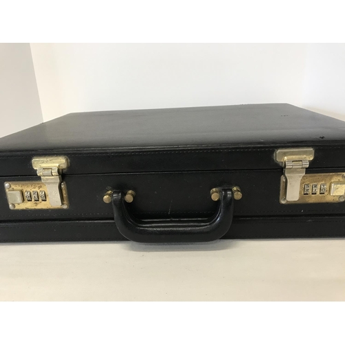 117 - Black leather briefcase with combination locks [010 / 210 ]