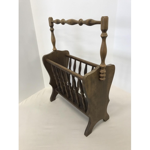 582 - Pine spindle sided magazine rack, 17