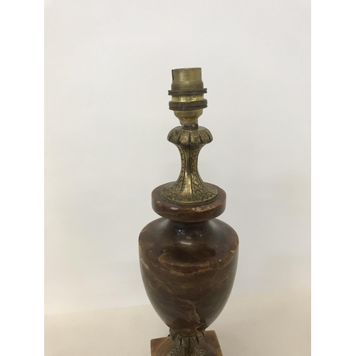 148 - Large brown marble base an bodied brass table lamp in Grecian style, 19