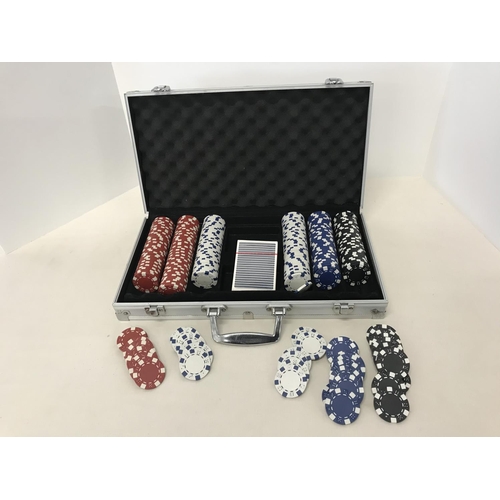 290 - Metal cased poker chip set with pack of sealed playing cards