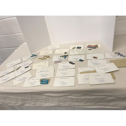 216 - Large collection of hand written envelopes containing British stamps dating back to the 1960's