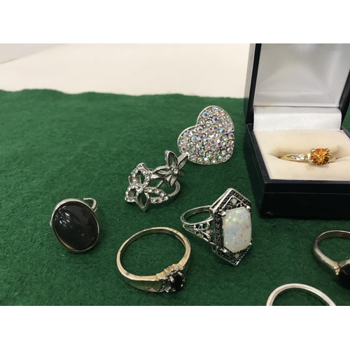 207 - Good collection of various gold tone and white metal rings