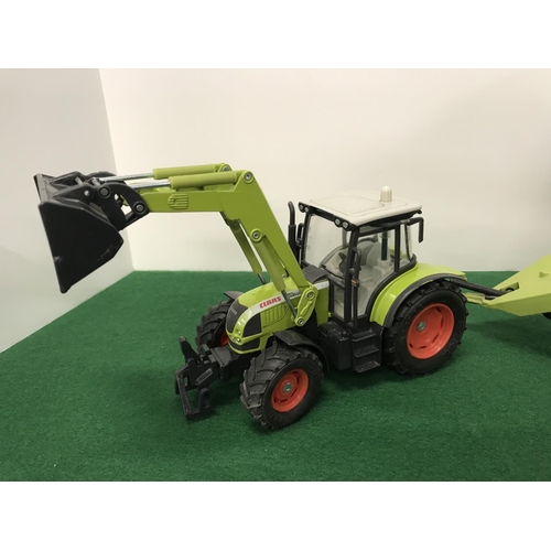 291 - Large green toy models in 2 different scales, A Tractor and a Trailer with moving parts