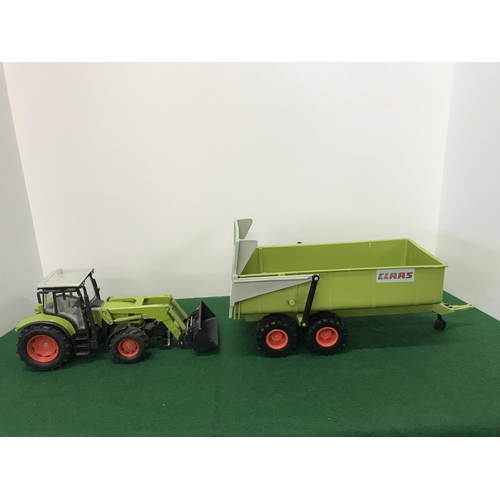 291 - Large green toy models in 2 different scales, A Tractor and a Trailer with moving parts