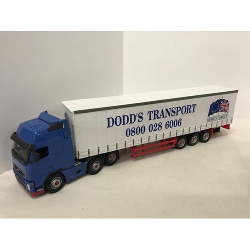 292 - Collection of large scale Volvo trucks with 4 trailers one depicting Dodd's Transport livery