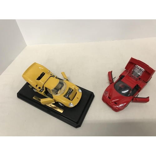 293 - 2 Die cast Burago models of Ferrari's