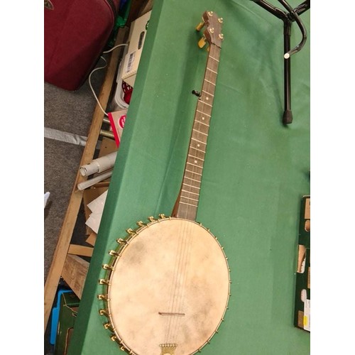 56 - 1890 Lyon and Healy 5 string banjo and stand