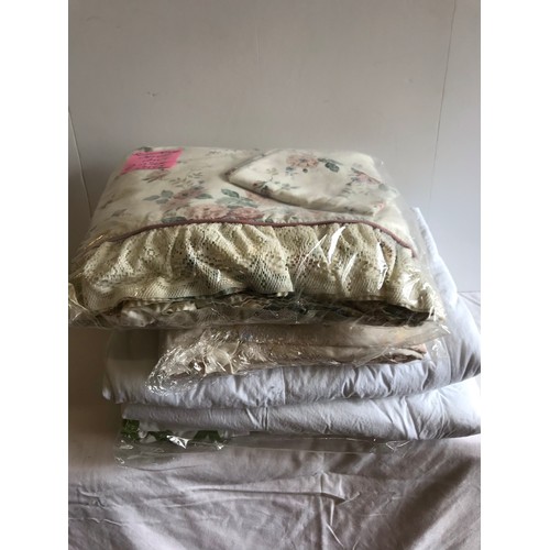 357 - Collection of duvet covers, quantity of mixed baggage ware and quantity of curtains mixed patterns  ... 