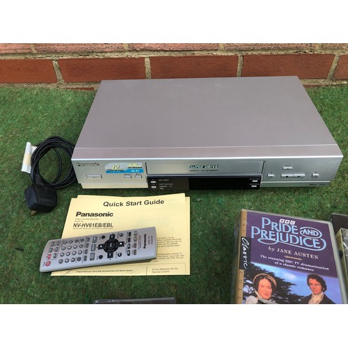 57 - Panasonic VHS player, remote and user instructions with a collection on VHS